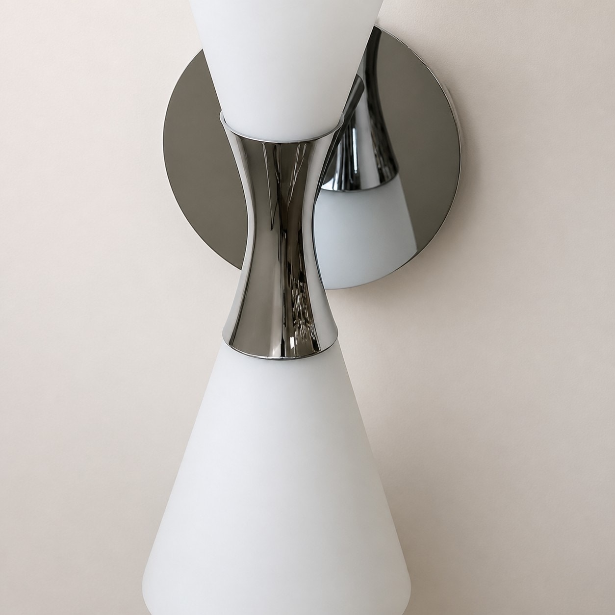 Round chrome wall plate and double shade structure detail